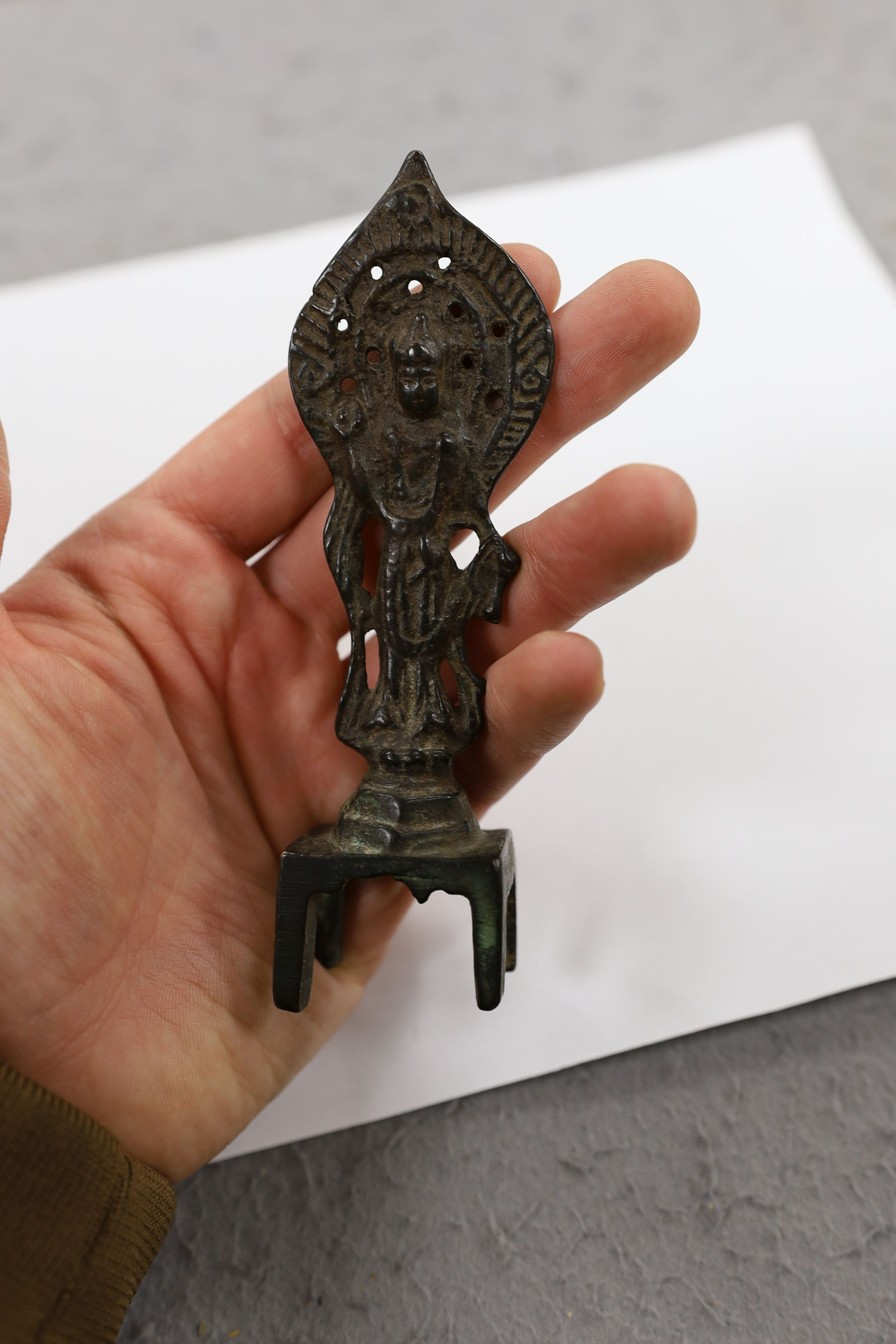 Five Chinese or Tibetan bronze figures or Buddhist implements, tallest 13cms high